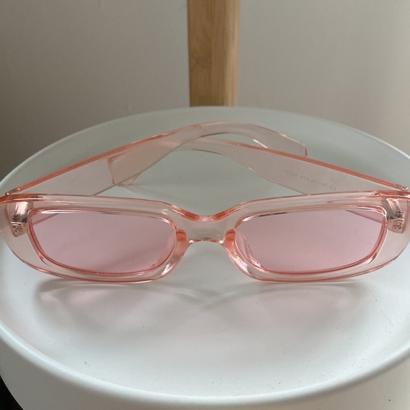 Are Wu pink translucent sunglasses. Never worn. Great condition. - Picture 10 of 11
